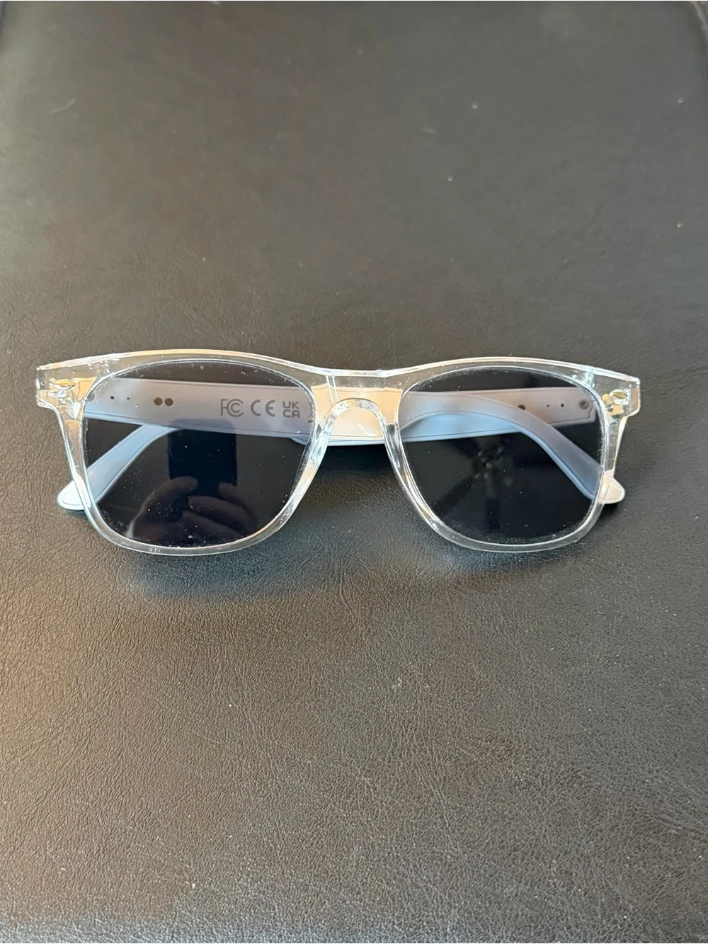 Clear Frame UV-A&B Smart Sunglasses, earbuds & microphone for 8 hours talk